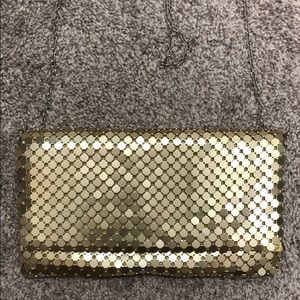 Gold bag with magnet secure to shut